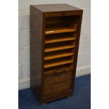 AN EARLY TO MID TWENTIETH CENTURY OAK TAMBOUR FRONT CABINET, with six slides, width 46cm x depth