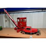 A CHAD VALLEY UBUILDA TINPLATE CLOCKWORK TWO DOOR SALOON CAR, of nut and bolt construction,