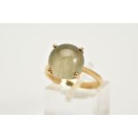 A 9CT GOLD TOURMALATED QUARTZ RING, designed with a claw set cabochon, tapered shoulders, hallmarked