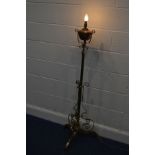 AN NEARLY TWENTIETH CENTURY ART NOUVEAU BRASS TELESCOPIC STANDARD LAMP, with a brass reservoir,