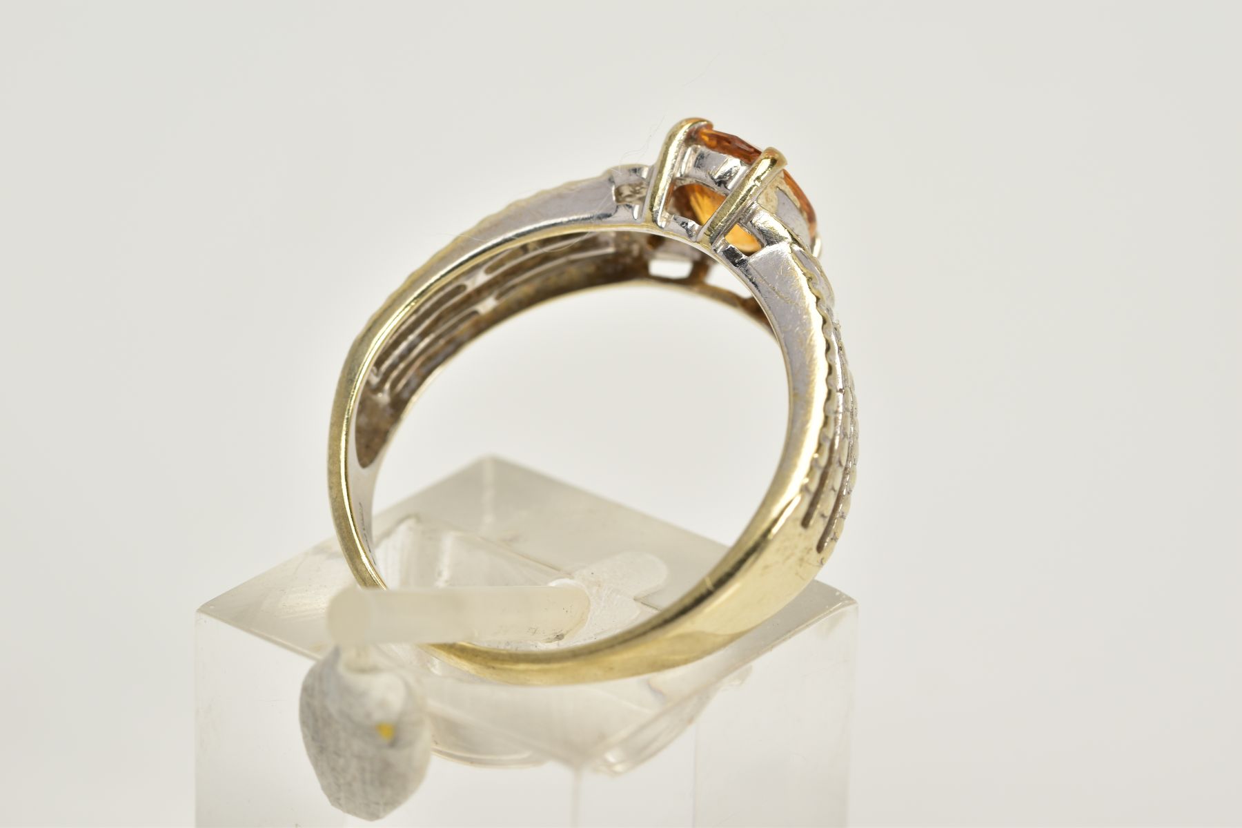 A 9CT WHITE GOLD YELLOW SAPPHIRE RING, designed with a claw set, oval cut yellow sapphire, flanked - Image 3 of 3