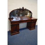 A VICTORIAN MAHOGANY MIRRORBACK PEDESTAL SIDEBOARD, carved foliate decoration, inverted