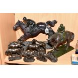 A GROUP OF BRONZE FINISH RESIN SCULPTURES OF HORSES AND HORSE AND RIDERS, comprising Heredities '