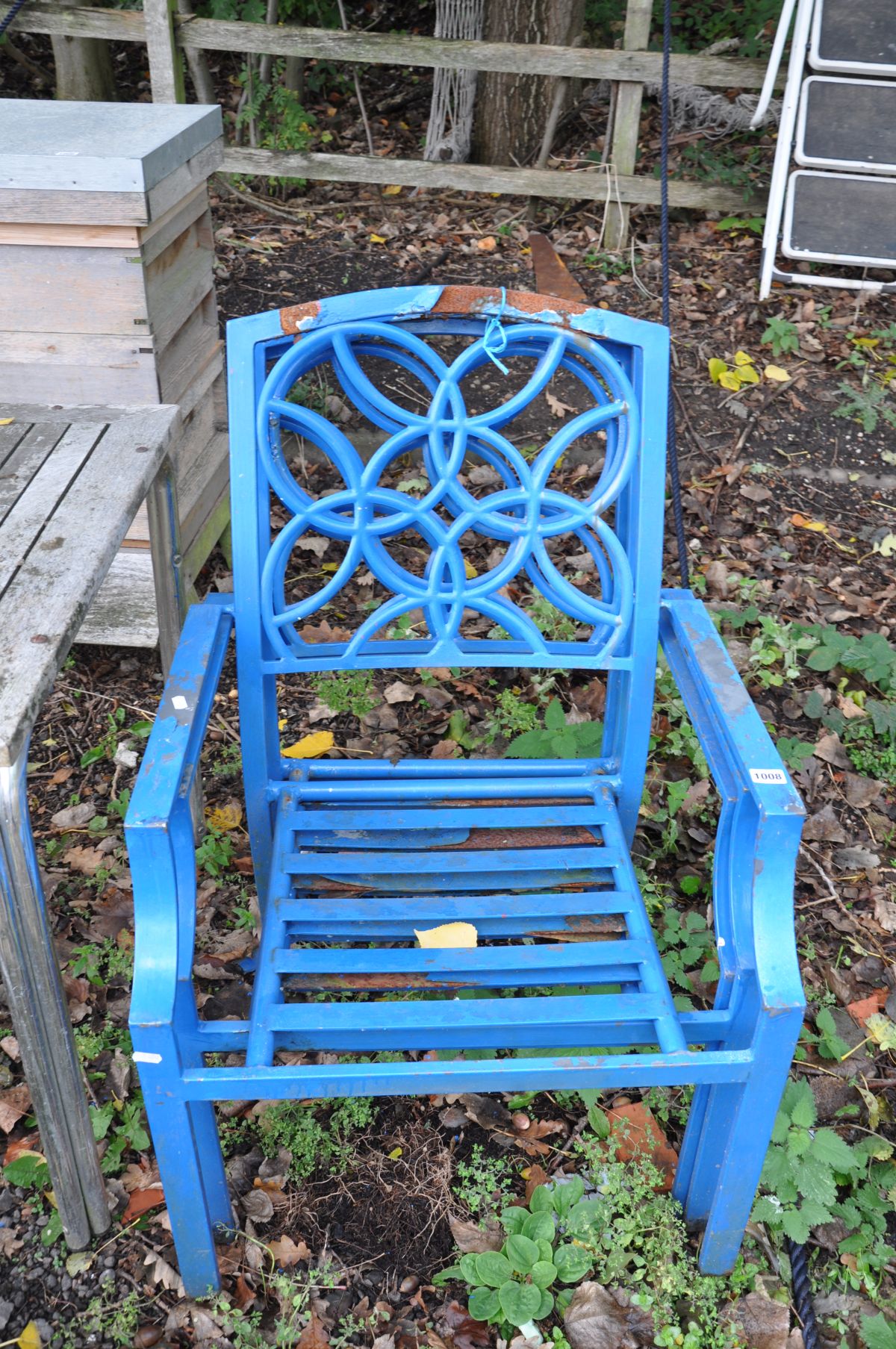 A SET OF THREE STACKING STEEL GARDEN CHAIRS in blue, width 54cm between arms (3)