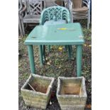 A GREEN PLASTIC GARDEN TABLE, 78cm x 78cm x 76cm high, four similar stacking chairs, a parasol