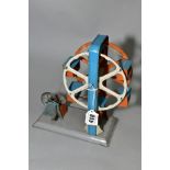 A KW CENTRIMOTOR HAND CRANKED TINPLATE FERRIS WHEEL, appears complete and in fairly good