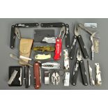 A NUMBER OF MULTI TOOLS comprising of a Ricardo multi tool, seven unnamed multi tools, a set of