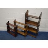 AN EARLY TO MID TWENTHIETH CENTURY OAK THREE TIER BOOKCASE, with carved quatrefoils to the side,