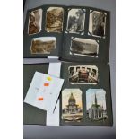 TWO VINTAGE POSTCARD ALBUMS, one containing approximately 145 sepia photographic postcards of mostly