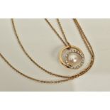 A CULTURED PEARL AND DIAMOND PENDANT NECKLACE, the circular openwork pendant, set with a single