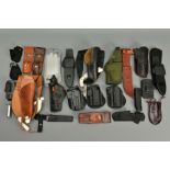 A COLLECTION OF HOLSTERS AND LEATHER ITEMS comprising of two unnamed leather shoulder holsters,