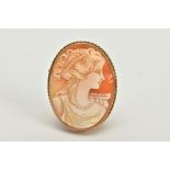 A 9CT GOLD CAMEO BROOCH/PENDANT, of oval design depicting a lady in profile, collet mount and rope