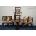 AN EARLY TO MID 20TH CENTURY OAK OVAL TOPPED GATE LEG TABLE, together with a set of five rush seated