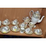 A WEDGWOOD BONE CHINA COFFEE SET, pattern No. W4219 (Gold Florentine), mixed backstamps/ages,