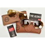 TWO PAIRS OF RAY-BAN SUNGLASSES, the first of aviator style, brown tinted glass with yellow metal