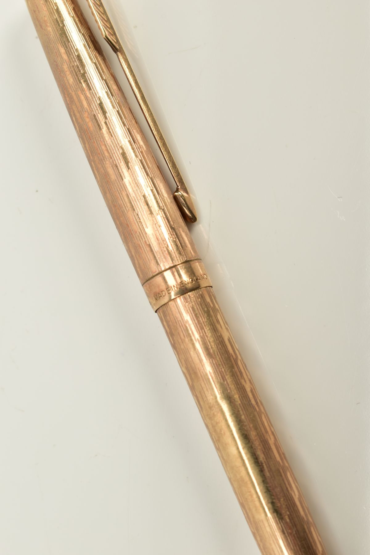 A 9CT GOLD BALL POINT PARKER PEN, of engine turn design, hallmarked 9ct gold London, approximate - Image 2 of 3