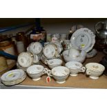 A COLLECTION OF CERAMICS, including Victorian white tea wares, having gilt decoration, a pair of