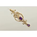 A 9CT GOLD AMETHYST AND SPLIT PEARL PENDANT, of open scroll design, set with a central oval cut