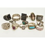A SELECTION OF WHITE METAL RINGS, to include thirteen rings of various designs such as a rectangular
