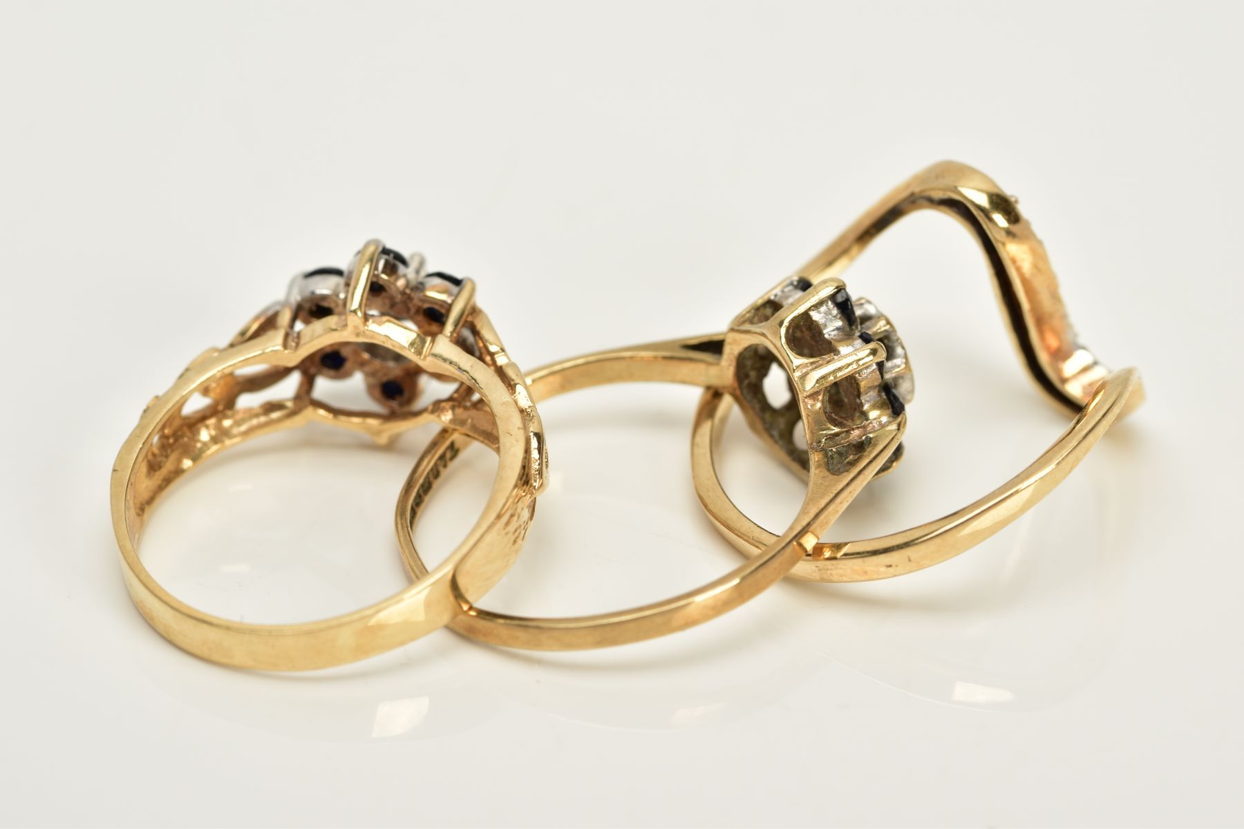 THREE 9CT GOLD SAPPHIRE AND DIAMOND RINGS, to include two clusters, each designed with a single - Image 3 of 3