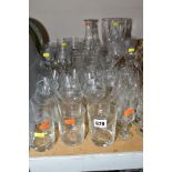 A PARCEL OF DRINKING GLASSES WITH WHEEL CUT DESIGN OF FLOWERS AND FOLIAGE, to include whiskey,