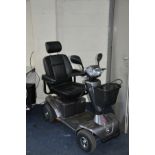 A SUNRISE MEDICAL S425 FOUR WHEELED DISABILITY SCOOTER with charger and one key (PAT pass and