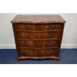 A REPRODUCTION FLAME MAHOGANY AND CROSSBANDED SERPENTINE CHEST OF TWO OVER THREE DRAWERS, in the