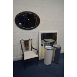 AN ARTS AND CRAFTS BEATON COPPER FRAMED OVAL BEVELLED EDGE WALL MIRROR, together with an Edwardian