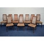 A SET OF TEN 1970'S TEAK DINING CHAIRS with pink upholstered seats and back (sd)