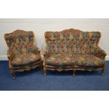 A TWENTIETH CENTURY FRENCH STYLE BEECH FRAMED TWO PIECE SUITE, covered in floral upholstery with a