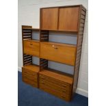 A STAPLES LADDERAX TEAK TWO SECTION WALL MODULAR SHELFING SYSTEM, comprising two tall wooden