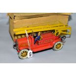 A DISTLER TINPLATE CLOCKWORK FIRE ENGINE, missing extension ladder and winding mechanism and