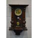 A LATE NINETEENTH CENTURY VIENNA WALL CLOCK (pendulum and winding key) (losses)