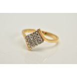 AN 18CT GOLD DIAMOND RING, designed with a lozenge of single cut diamonds, crossover over shoulders,