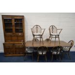 A ERCOL (GOLDEN DAWN) DINING SUITE, comprising an extending table, with a single fold out leaf,