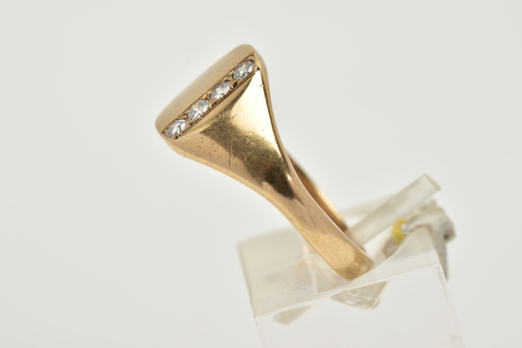 A 9CT GOLD GENTLEMANS DIAMOND SIGNET RING, the plain polished square design set with a row of - Bild 2 aus 3