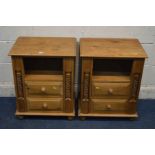 A PAIR OF PINE BEDSIDE CABINETS with two drawers, flanked with barley twist rope detail, width