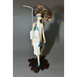 AN ALBANY BONE CHINA AND BRONZE FIGURE, 'Windsor' height 21cm