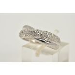 A WHITE METAL DIAMOND RING, of crossover design, set with a row of single cut diamonds, plain