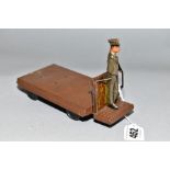 A TIPP & CO TINPLATE CLOCKWORK STATION LUGGAGE TROLLEY, playworn condition, missing trunk, driver