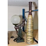 A MODERN ART DECO STYLE TABLE LAMP of seated woman holding satin crackled glass ball, height 42cm,