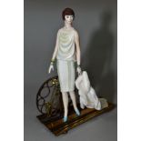 AN ALBANY BONE CHINA AND BRONZE FIGURE, 'Ritz', height 20cm