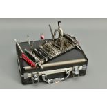 A SWISS WENGER GIANT ARMY KNIFE in a transit metal case, it houses eight seven implements and