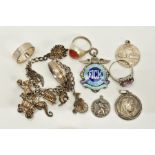 A SELECTION OF JEWELLERY, to include a white metal charm bracelet, suspending nine charms such as