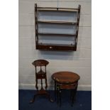 A REPRODUCTION MAHOGANY HANGING FOUR TIER OPEN BOOKSHELF, with fretwork to sides above two drawers