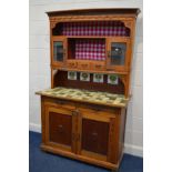 AN EARLY 20TH CENTURY AND LATER FRENCH PITCH PINE DRESSER, the top with a domed front, above a