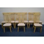 A SET OF TEN MODERN BLEACHED OAK DINING CHAIRS