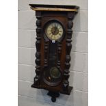 A LATE 19TH CENTURY MAHOGANY AND WALNUT VIENNA REGULATOR WALL CLOCK, with an enamel dial with