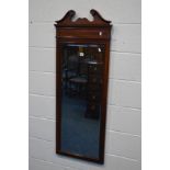 A LONG RECTANGULAR REPRODUCTION MAHOGANY AND INLAID BEVELLED EDGE WALL MIRROR with a swan neck
