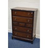 A TALL STAG MINSTREL CHEST OF THREE SHORT AND FOUR LONG DRAWERS, width 82cm x depth 46cm x height